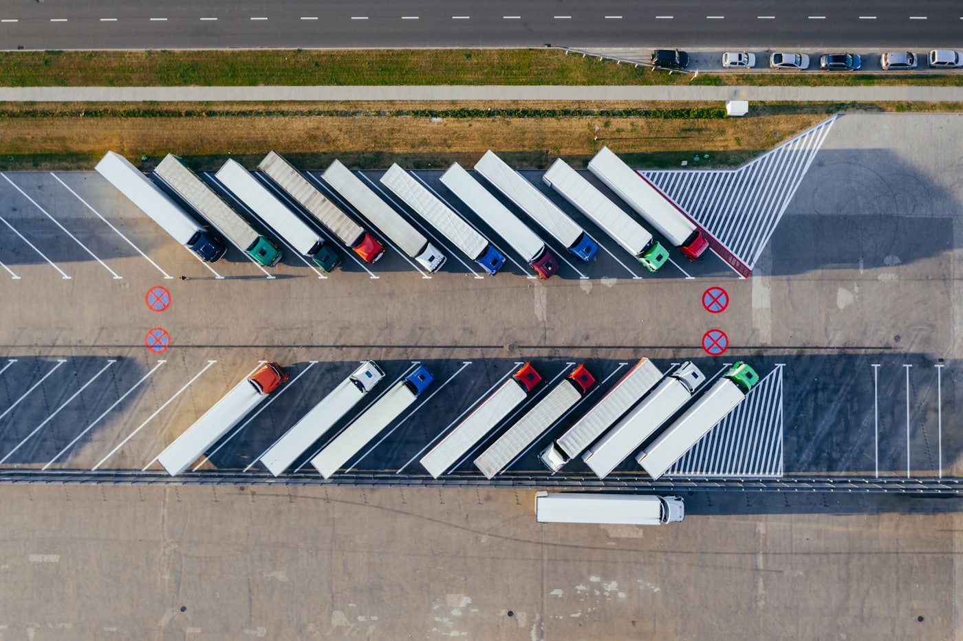 Container trucks staged for loading