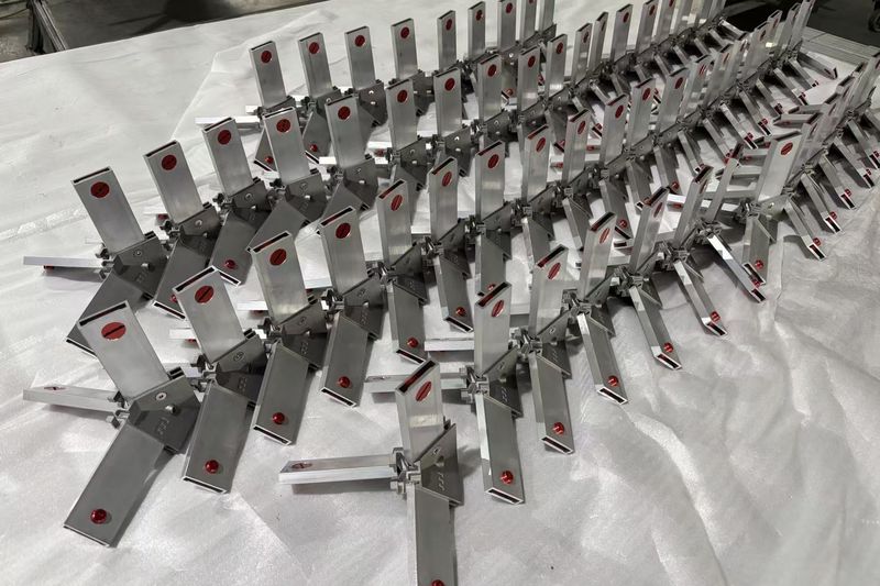 Finished sheet-metal parts inspected as a batch